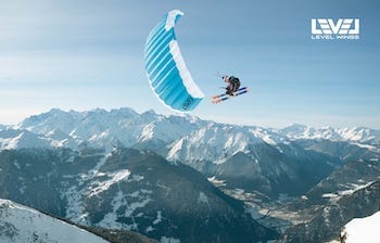 wallpaper of a speedrider speedriding in the air with fizz miniwing in the alps tumbnail